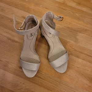 Woman's gold high heels